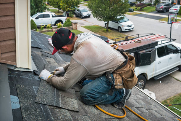 Professional Roofing technician working in Rochester, IL